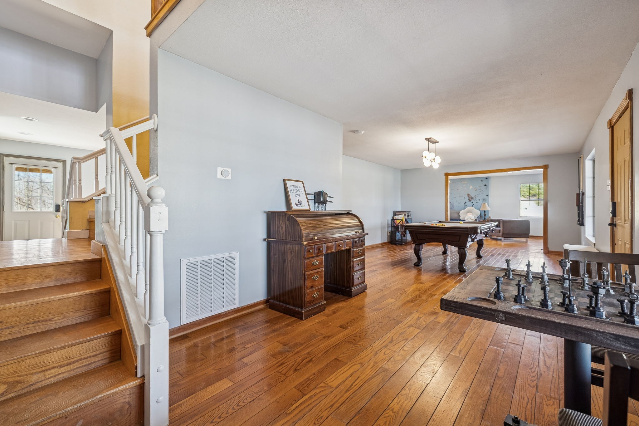 485 Lower Roans Creek Road Linden, TN 37096 - Photo 21 of 43 a living room with furniture and a wooden floor