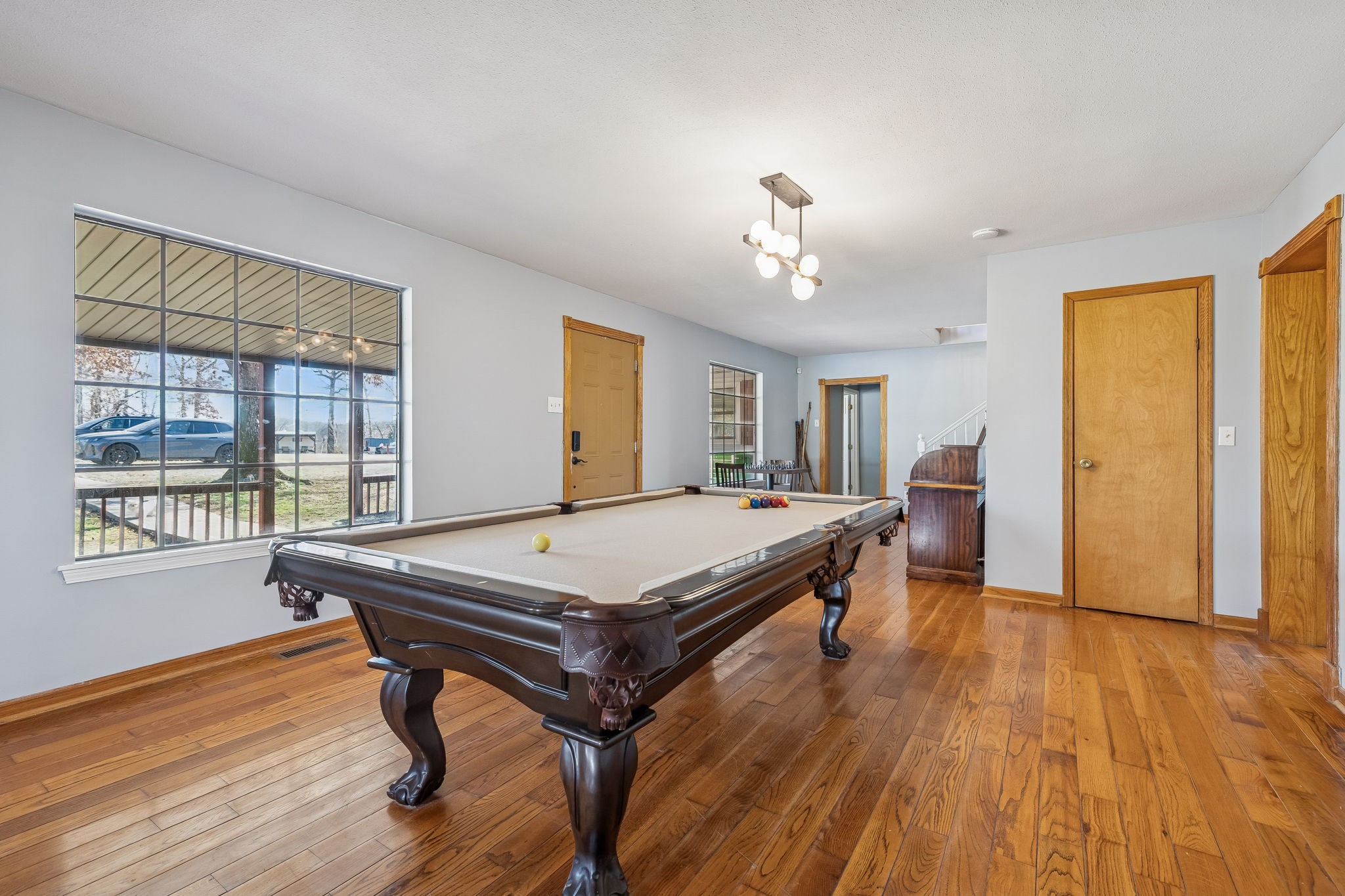 485 Lower Roans Creek Road Linden, TN 37096 - Photo 23 of 43 a room with pool table and windows