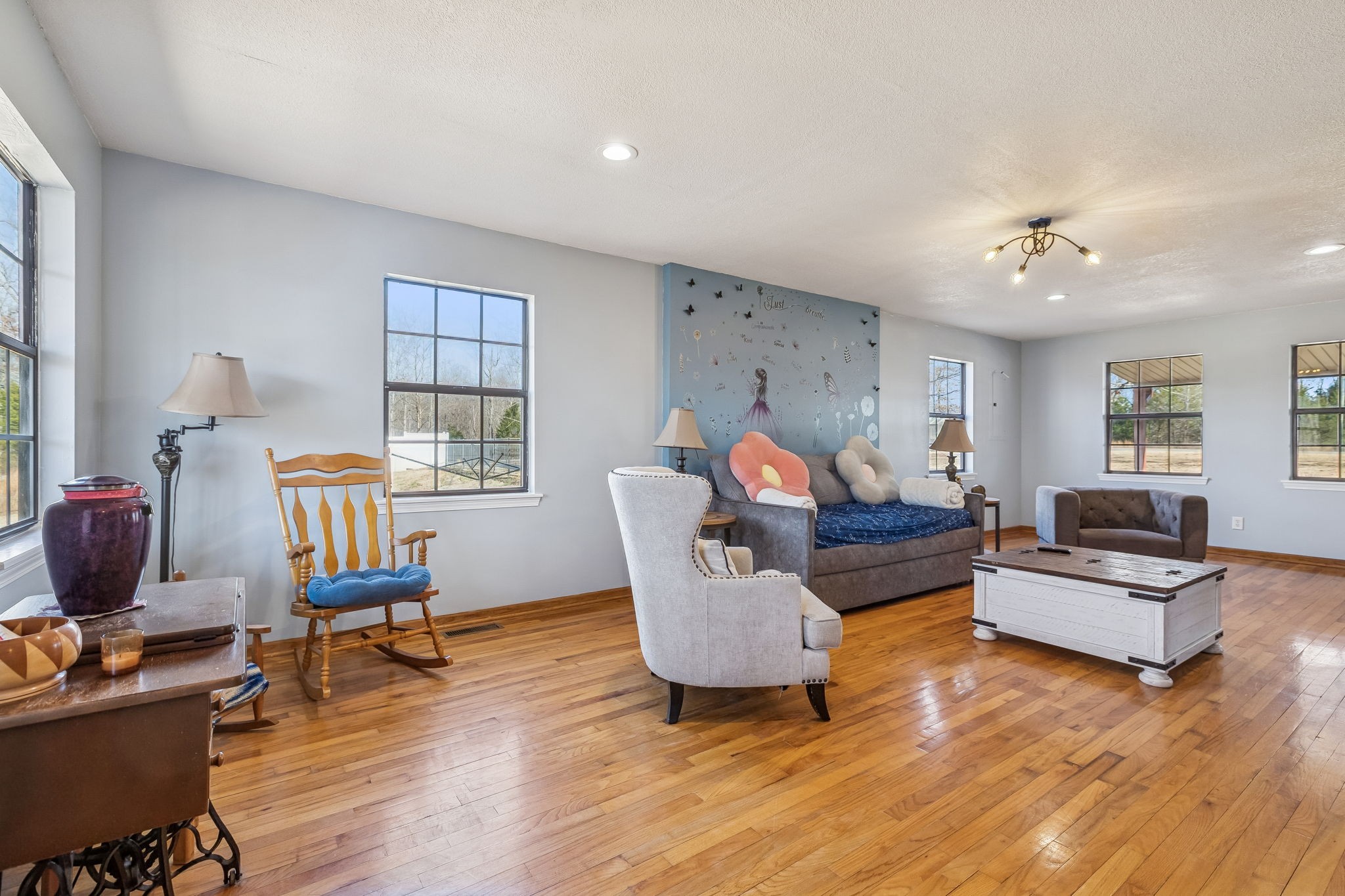 485 Lower Roans Creek Road Linden, TN 37096 - Photo 26 of 43 a living room with furniture and wooden floor