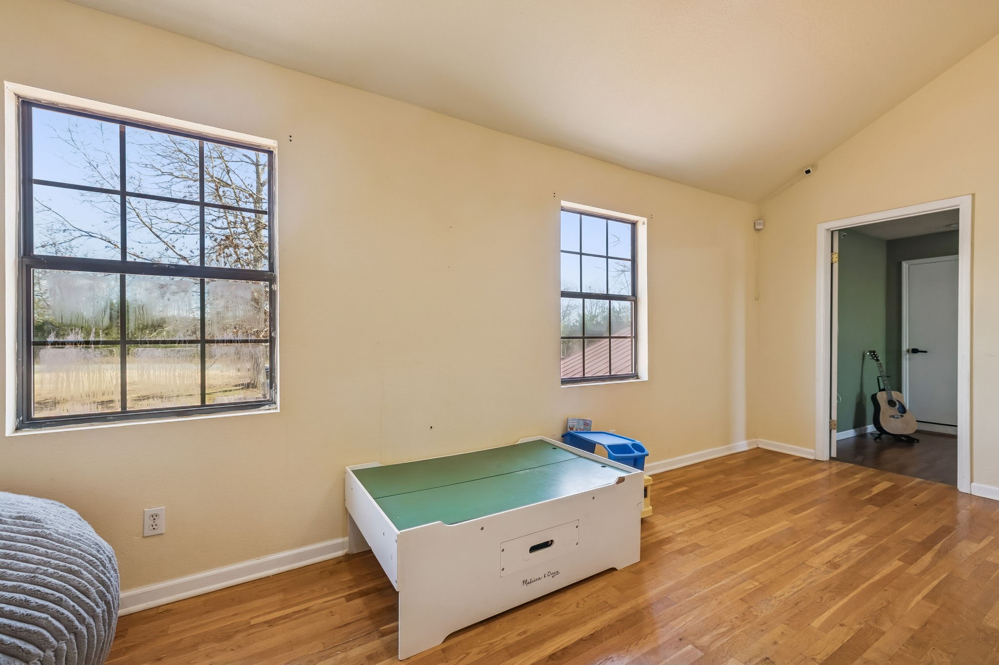 485 Lower Roans Creek Road Linden, TN 37096 - Photo 29 of 43 a room with bed and a window