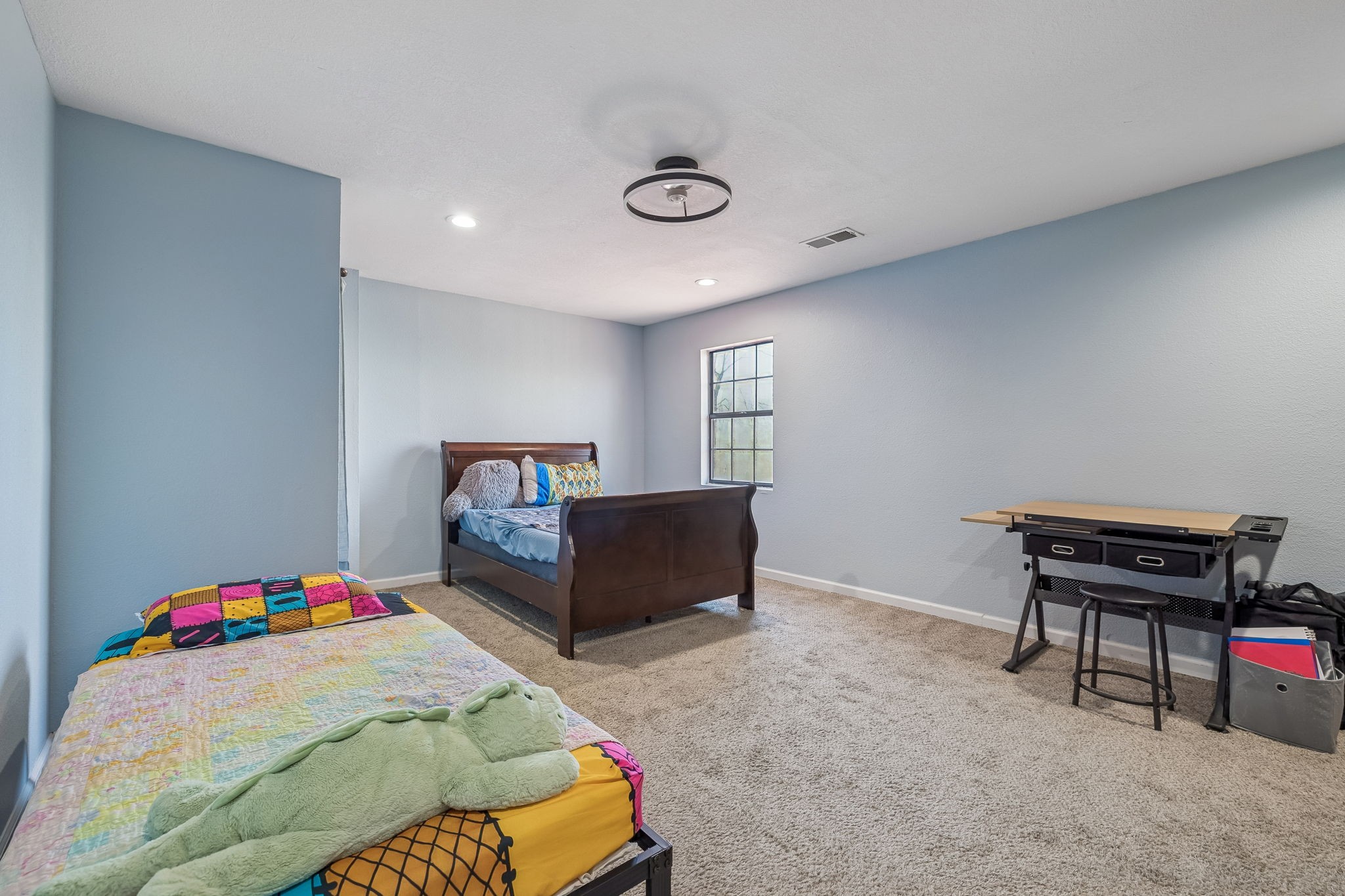 485 Lower Roans Creek Road Linden, TN 37096 - Photo 32 of 43 a bedroom with a bed and a desk
