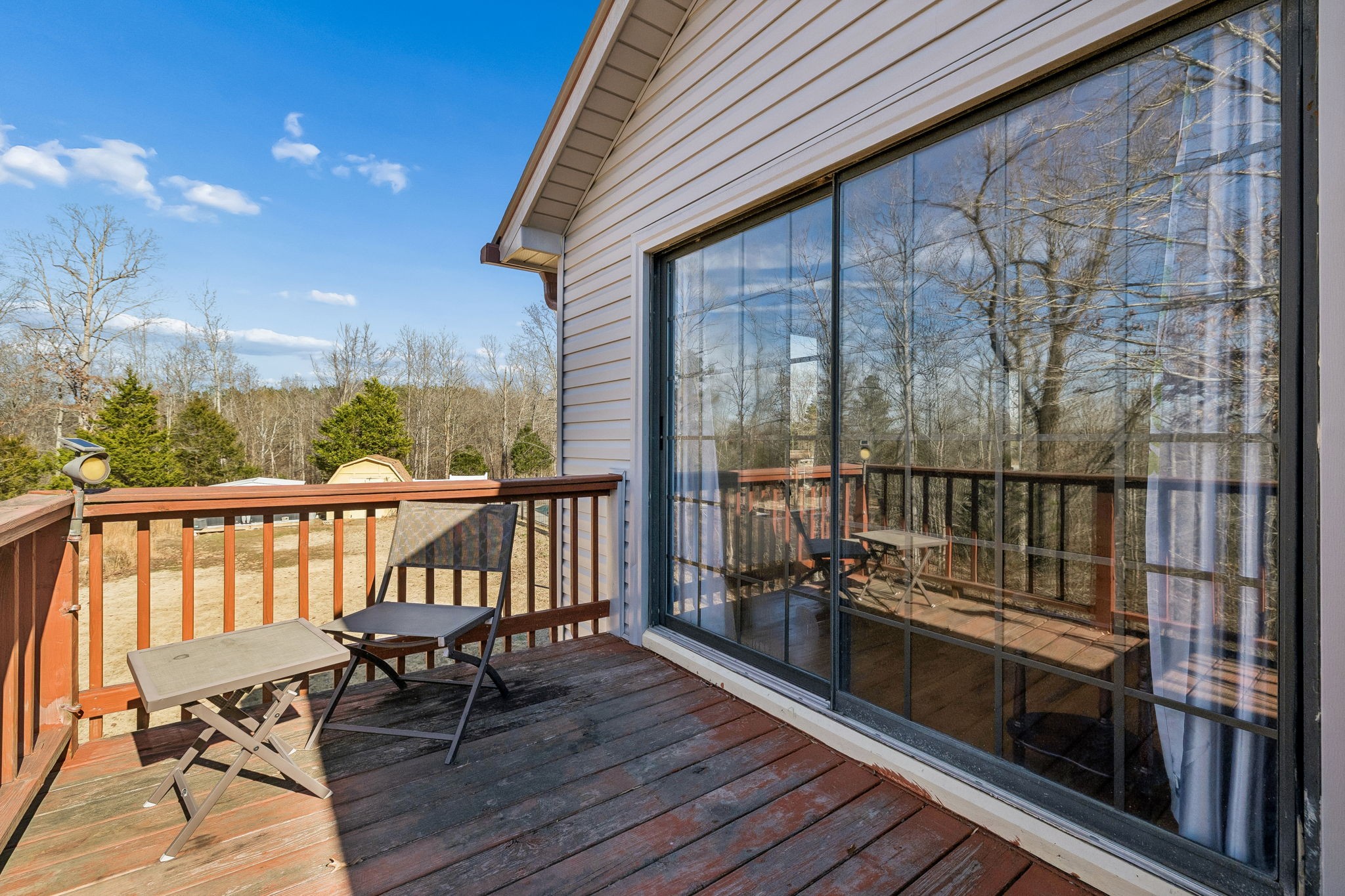 485 Lower Roans Creek Road Linden, TN 37096 - Photo 8 of 43 a view of balcony with chairs