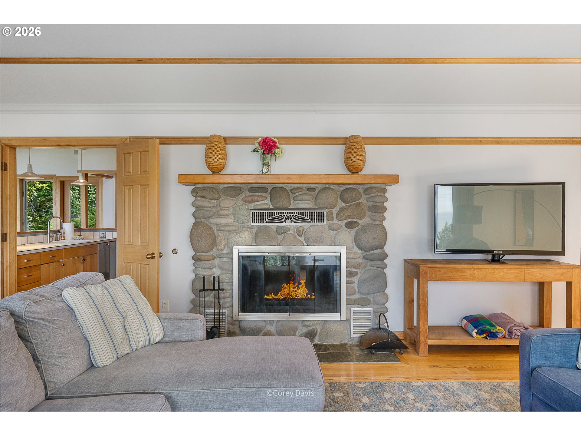38295 Beulah Reed Road Nehalem, OR 97131 - Photo 13 of 42 a living room with furniture and a fireplace