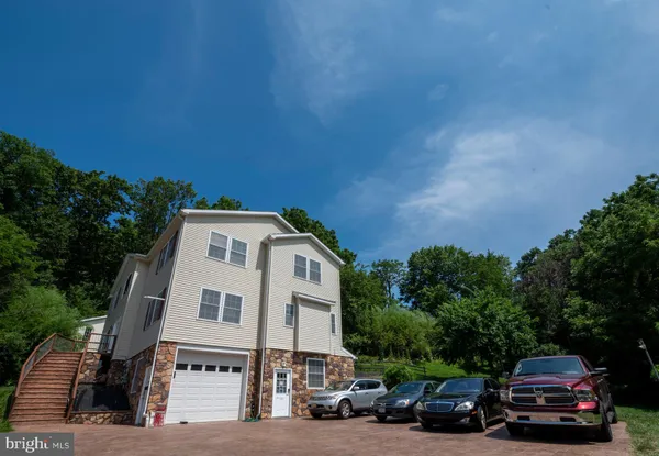 a car parked in front of a house