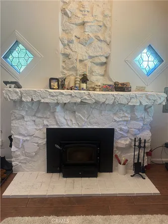 a living room with a fireplace