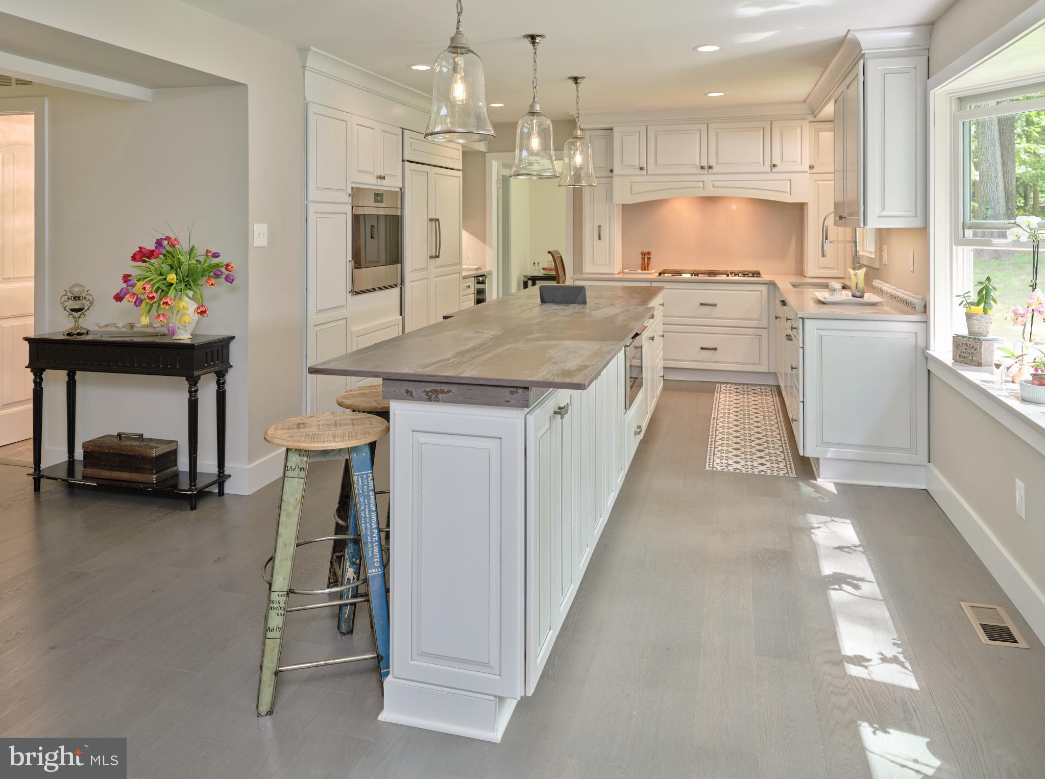 7000 Ely Road New Hope, PA 18938 - Photo 12 of 44 a kitchen with kitchen island a sink stove and refrigerator