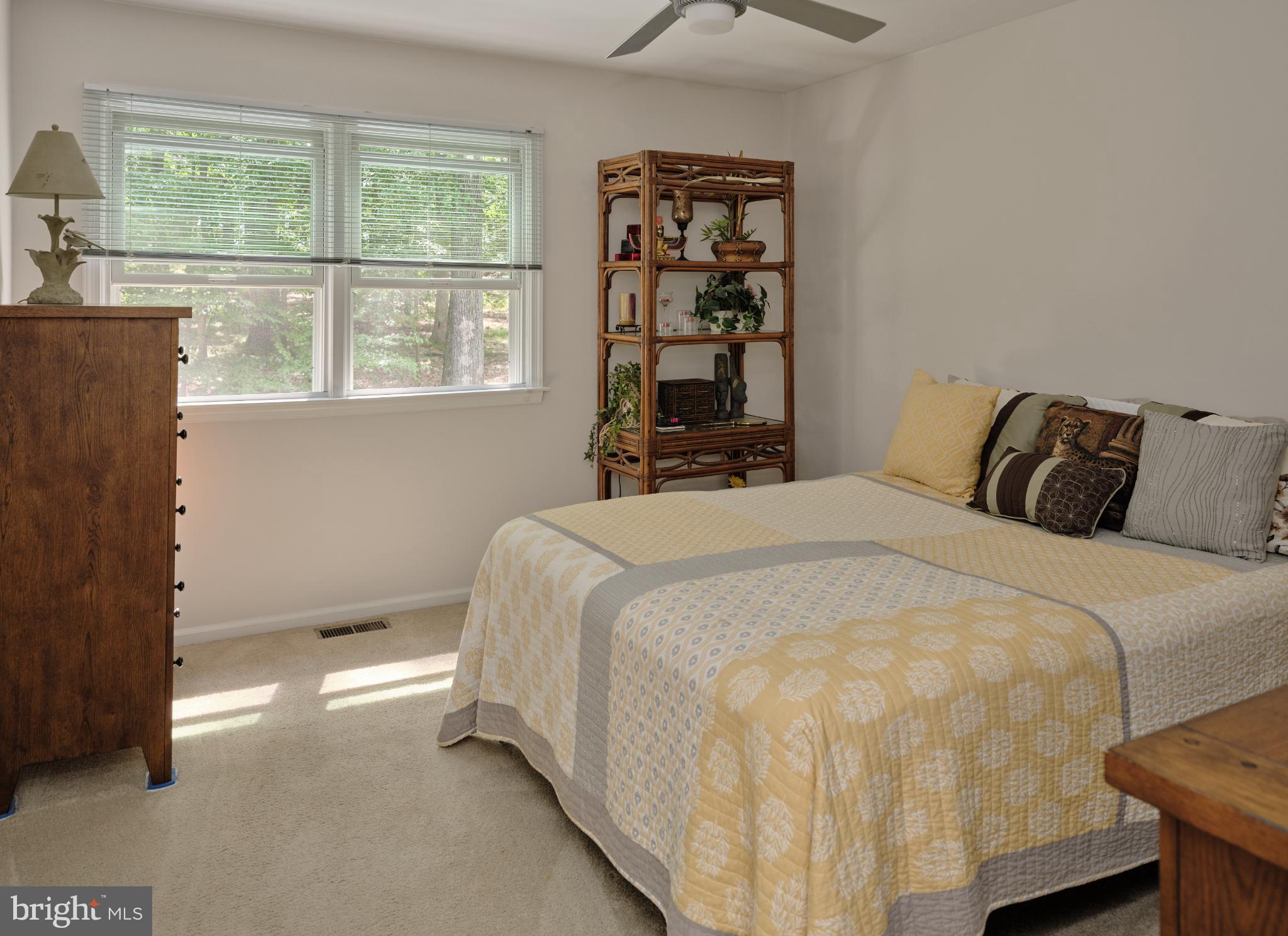 7000 Ely Road New Hope, PA 18938 - Photo 27 of 44 a large bed sitting in a bedroom next to a window