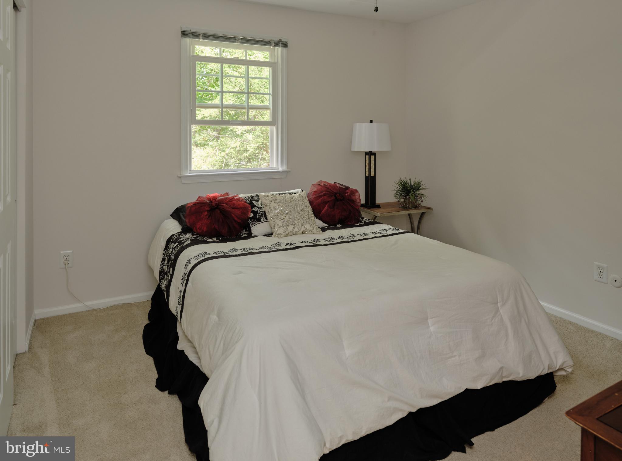 7000 Ely Road New Hope, PA 18938 - Photo 30 of 44 a bedroom with a bed and a window