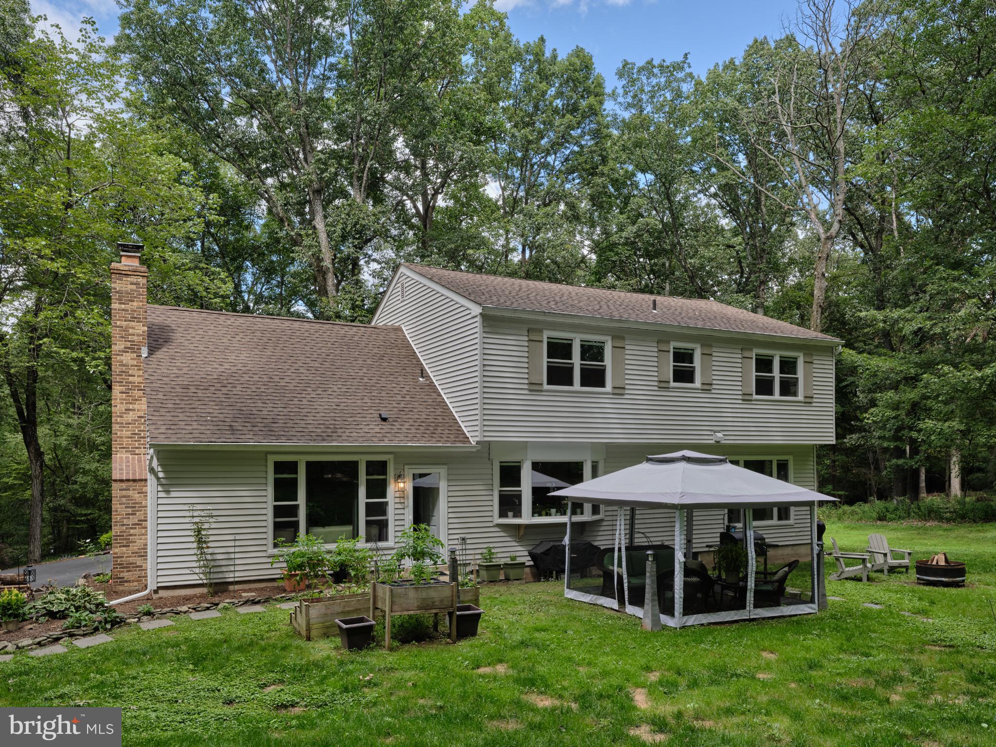 7000 Ely Road New Hope, PA 18938 - Photo 35 of 44 a view of a house with a yard patio and a garden