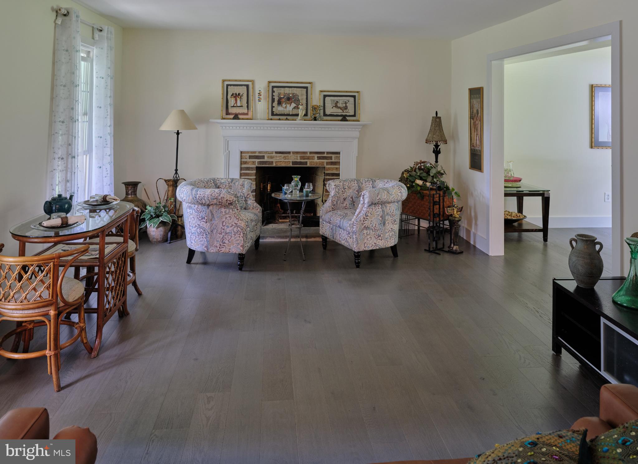 7000 Ely Road New Hope, PA 18938 - Photo 6 of 44 a living room with furniture and a fireplace