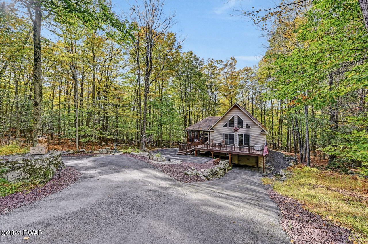 3295 Northgate Road Lake Ariel, PA 18436 - Photo 70 of 111 a front view of a house with a yard and trees