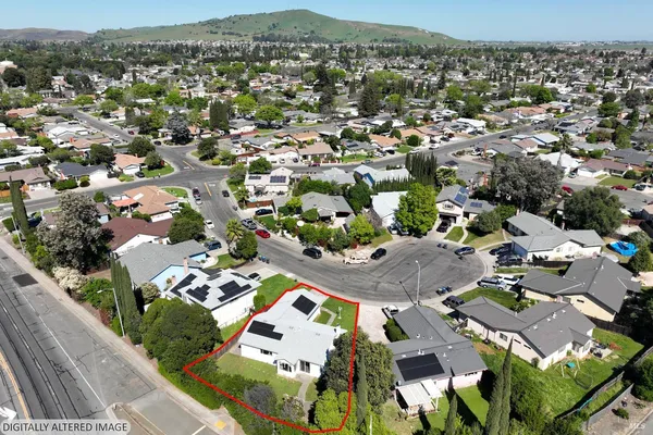 an aerial view of a city with lots of residential buildings