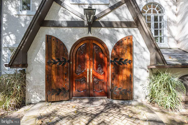 a view of entrance gate of a house