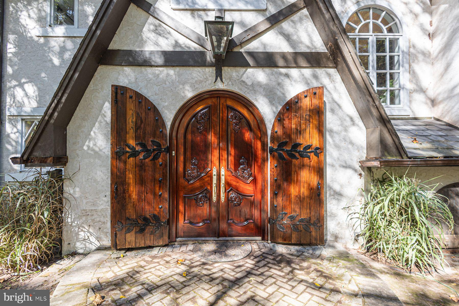 132 East Dark Hollow Road, Unit MAIN Pipersville, PA 18947 - Photo 2 of 29 a view of entrance gate of a house