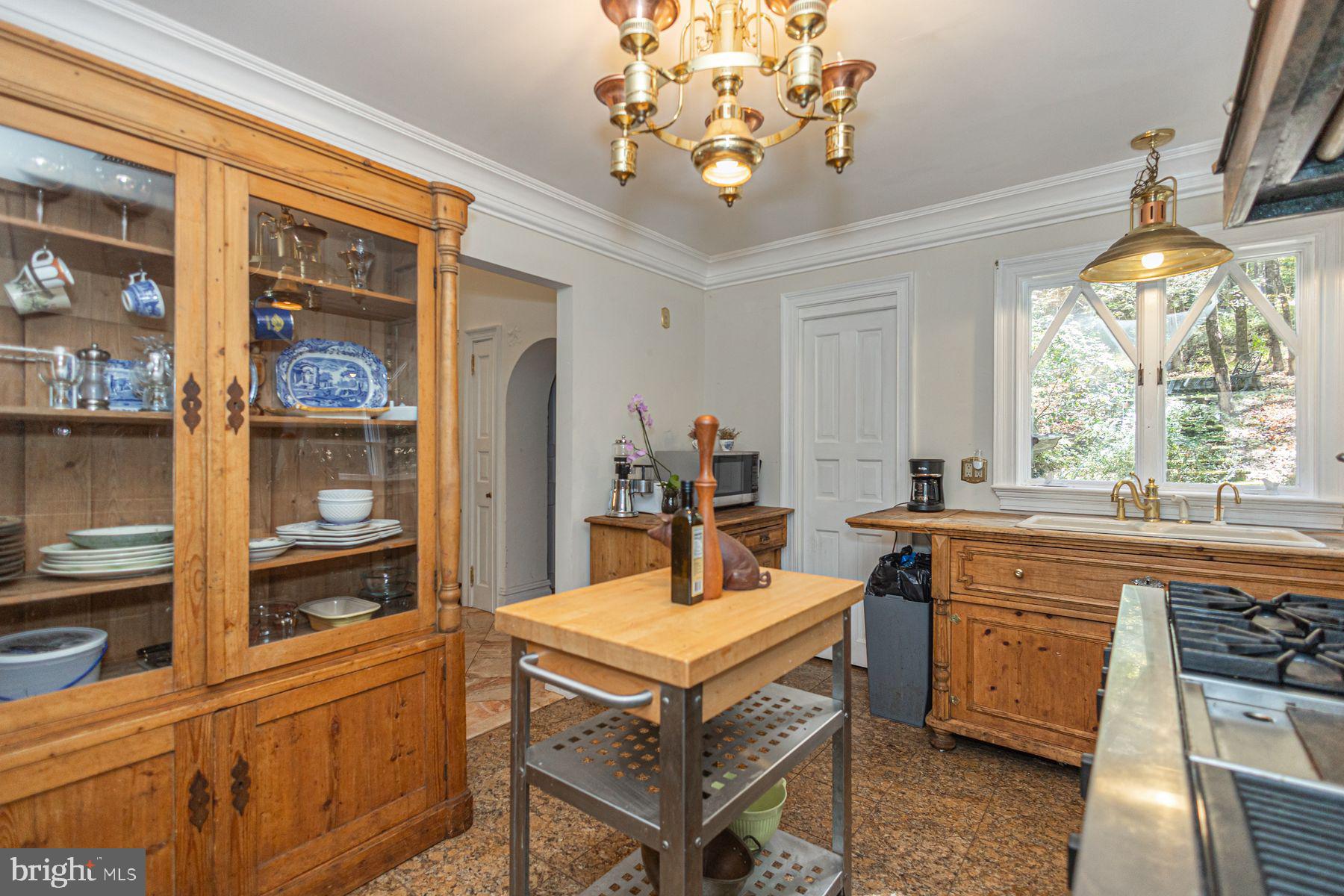 132 East Dark Hollow Road, Unit MAIN Pipersville, PA 18947 - Photo 5 of 29 a kitchen with stainless steel appliances granite countertop a stove a sink and a refrigerator