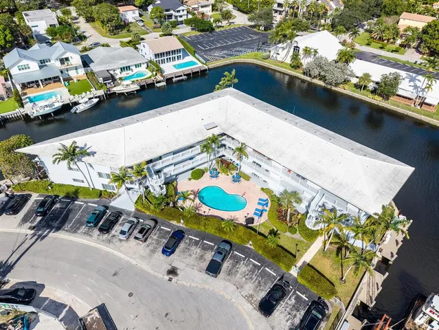 an aerial view of a house with outdoor space