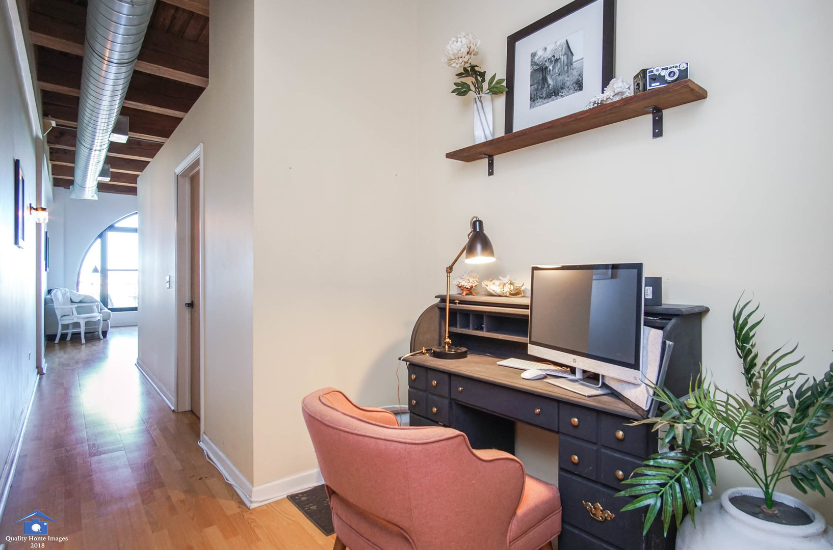 1503 South State Street, Unit 602 Chicago, IL 60605 - Photo 11 of 21 a view of a workspace with furniture and wooden floor