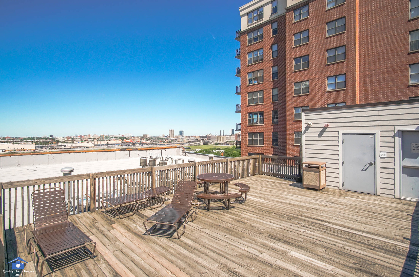 1503 South State Street, Unit 602 Chicago, IL 60605 - Photo 18 of 21 a view of a balcony with wooden floor