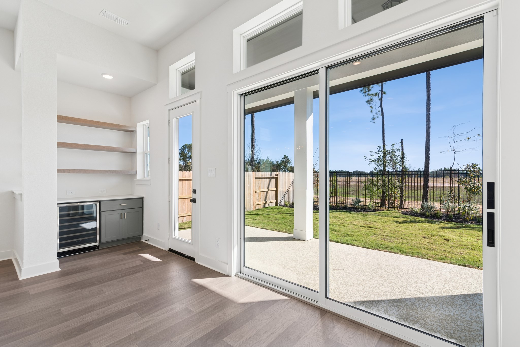 16138 Rita Road Conroe, TX 77302 - Photo 32 of 50 a view of a living room and a balcony