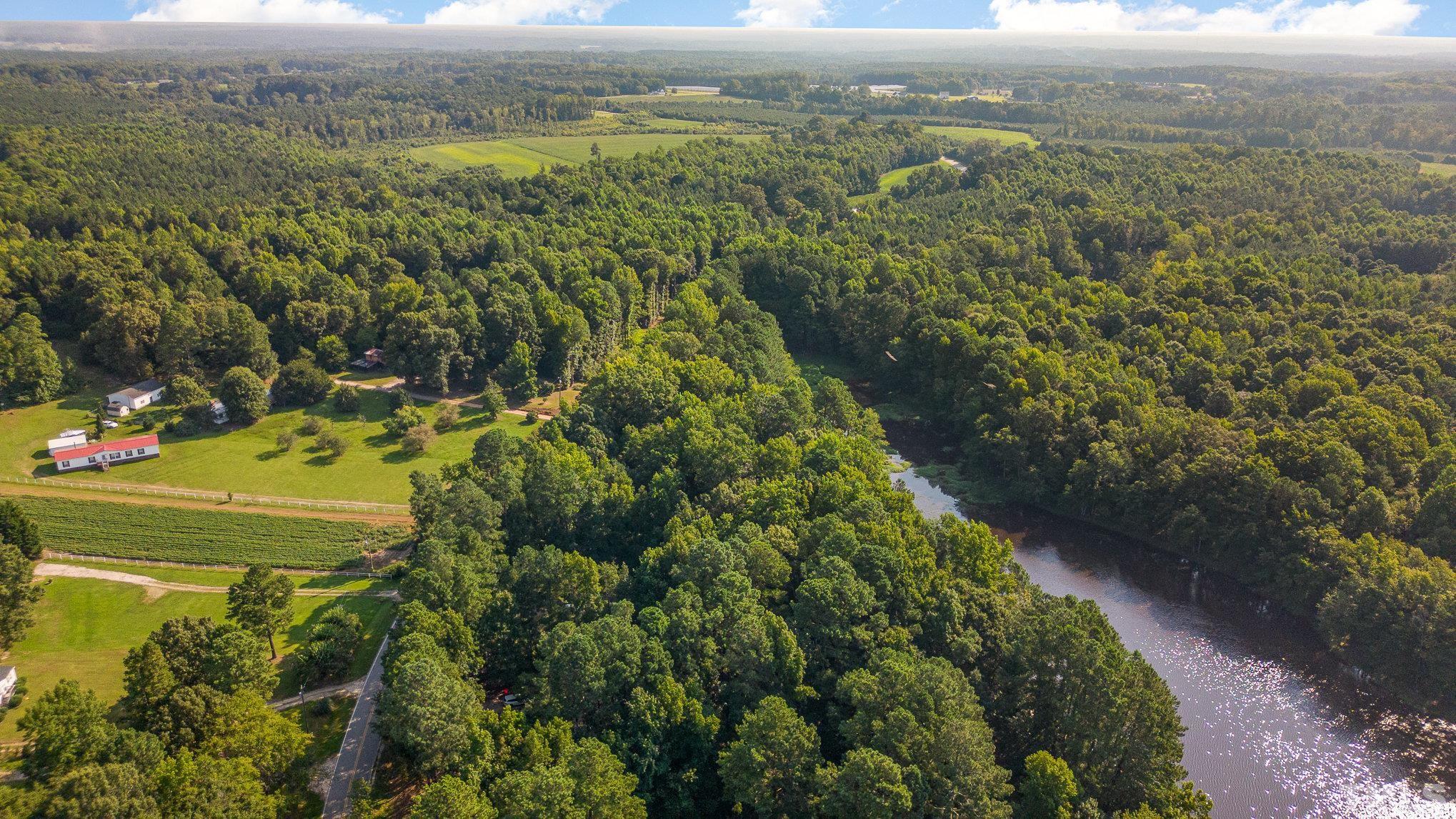 Lot 1 Wiley Road Spring Hope, NC 27882 - Photo 4 of 12 a view of a lake with a mountain in the background