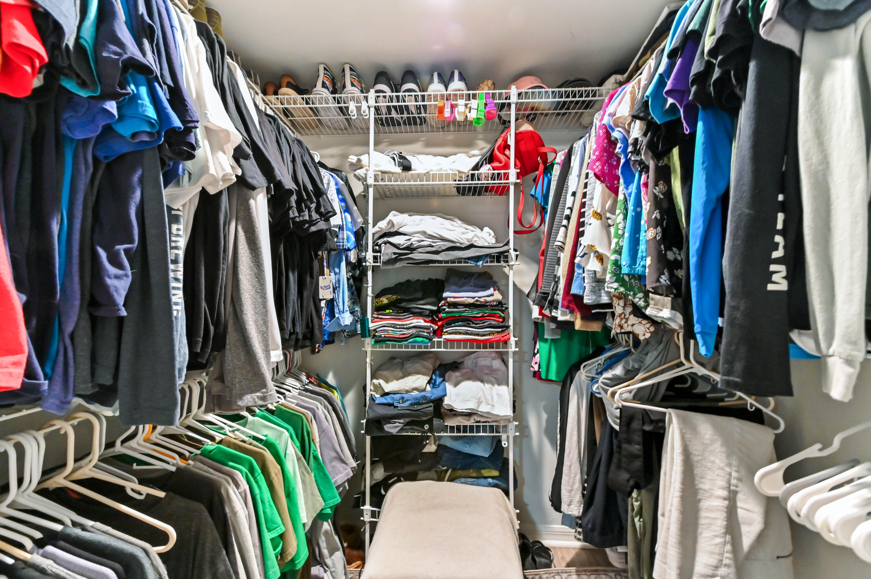 1230 Southeast Parkview Place, Unit D2 Stuart, FL 34994 - Photo 22 of 34 a view of walk in closet with clothes