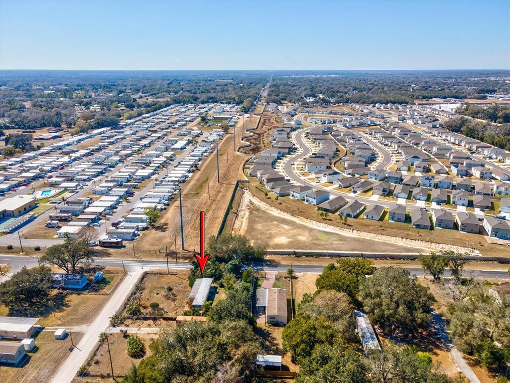 4512 Lane Road Zephyrhills, FL 33541 - Photo 5 of 14 an aerial view of a city