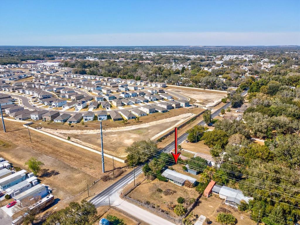 4512 Lane Road Zephyrhills, FL 33541 - Photo 6 of 14 an aerial view of a city