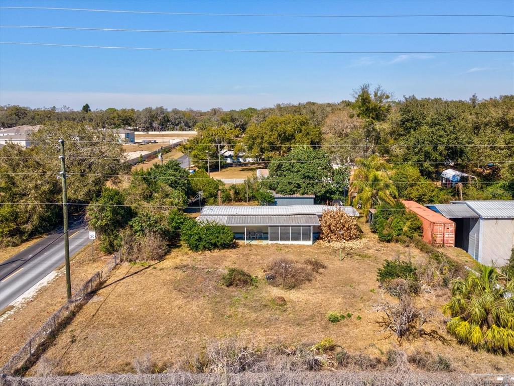 4512 Lane Road Zephyrhills, FL 33541 - Photo 10 of 14 a view of a lake with a mountain in the background
