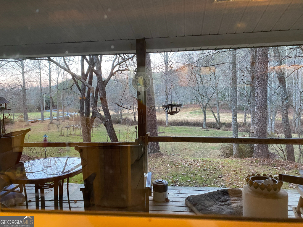 2594 Blue Ridge Gap Road Clayton, GA 30525 - Photo 13 of 77 a view of a chairs and table in the outdoor room