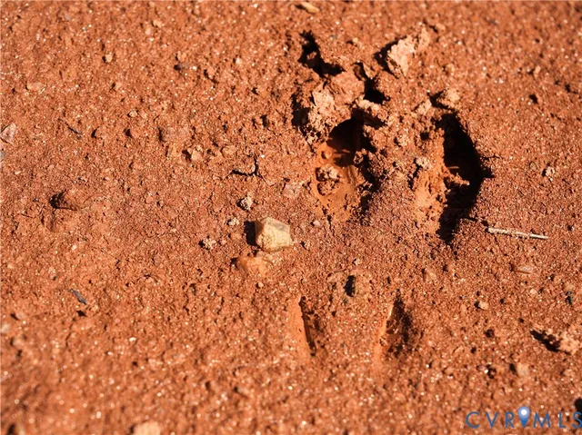 a view of a field with an outdoor space