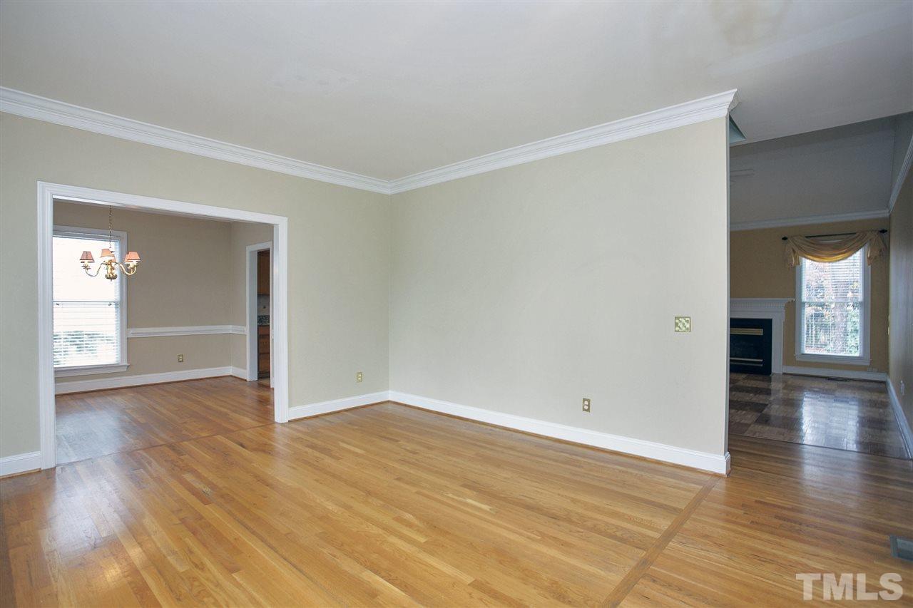 5216 Covington Bend Drive Raleigh, NC 27613 - Photo 3 of 15 The expansive living room offers a multitude of uses. It can be an office, a library, media room, or more formal living room. Use your imagination, and the possibilities are endless.