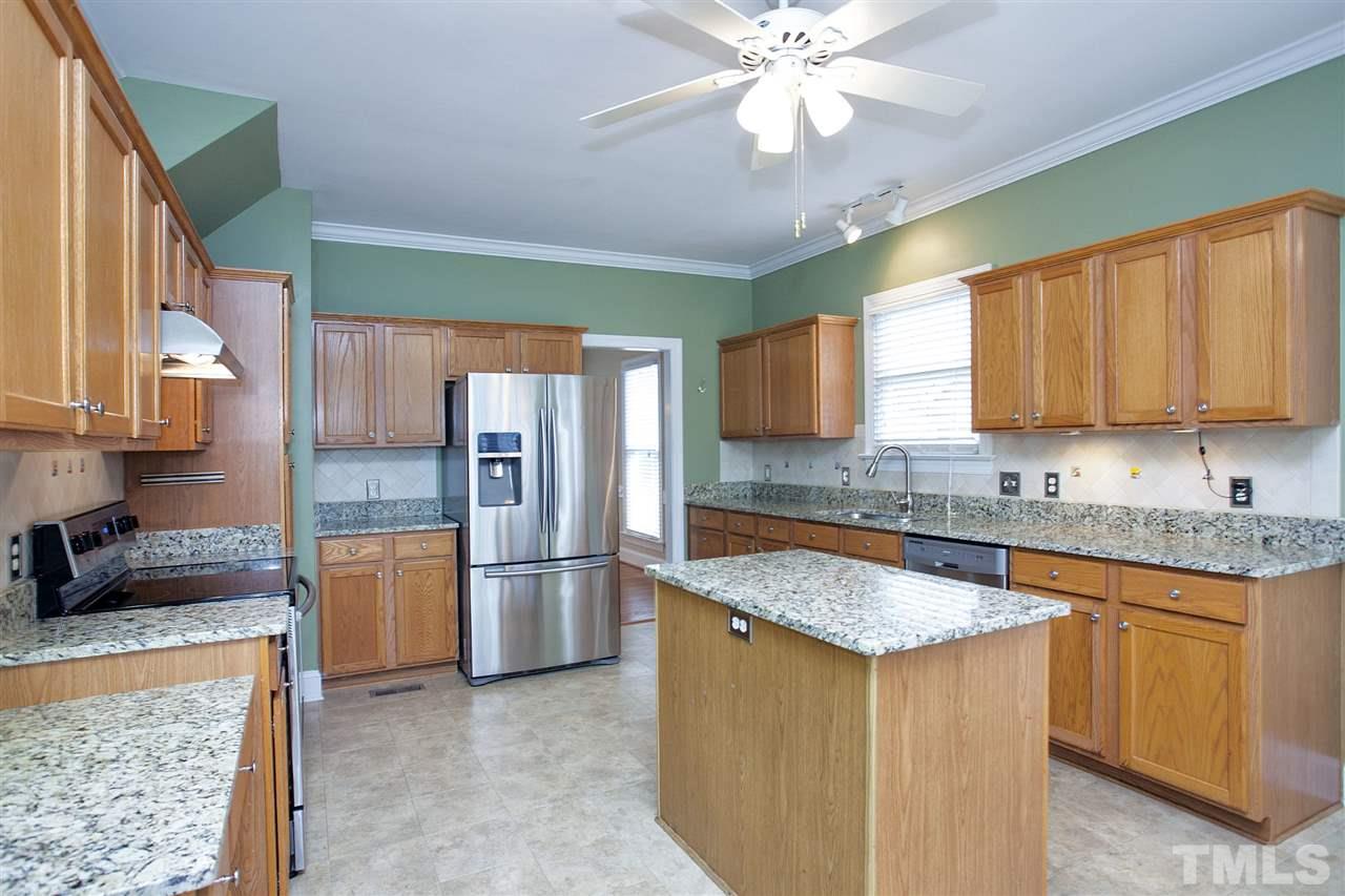 5216 Covington Bend Drive Raleigh, NC 27613 - Photo 4 of 15 You will love preparing gourmet meals, or light snacks, in the gourmet kitchen. With tons of counter space, this beautifully appointed kitchen will be the source of many memorable meals in your new home.
