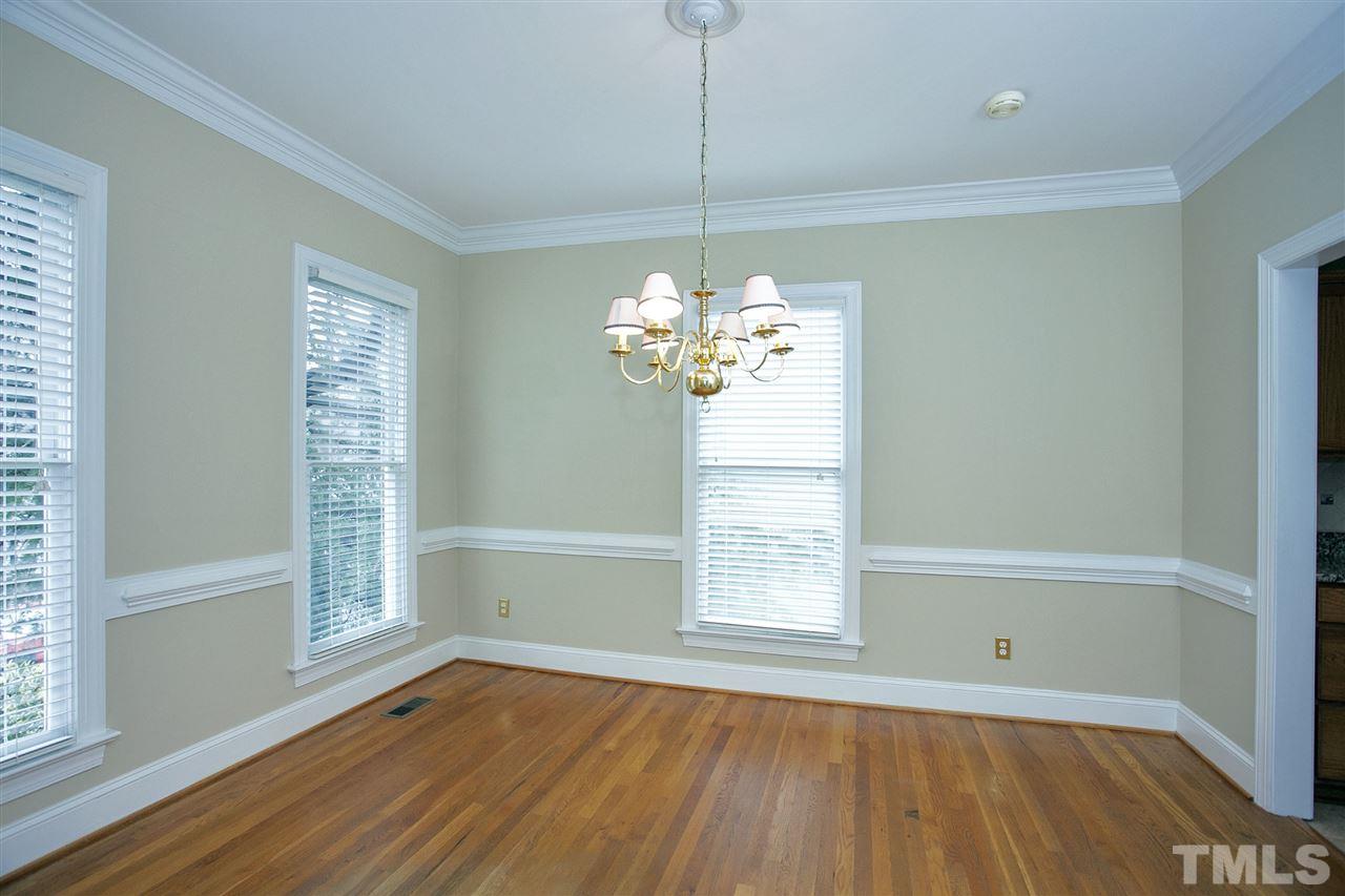 5216 Covington Bend Drive Raleigh, NC 27613 - Photo 7 of 15 The dining room is the perfect setting for enjoying meals prepared in your gourmet kitchen. Notice the extensive molding, usually found in high end, custom homes.