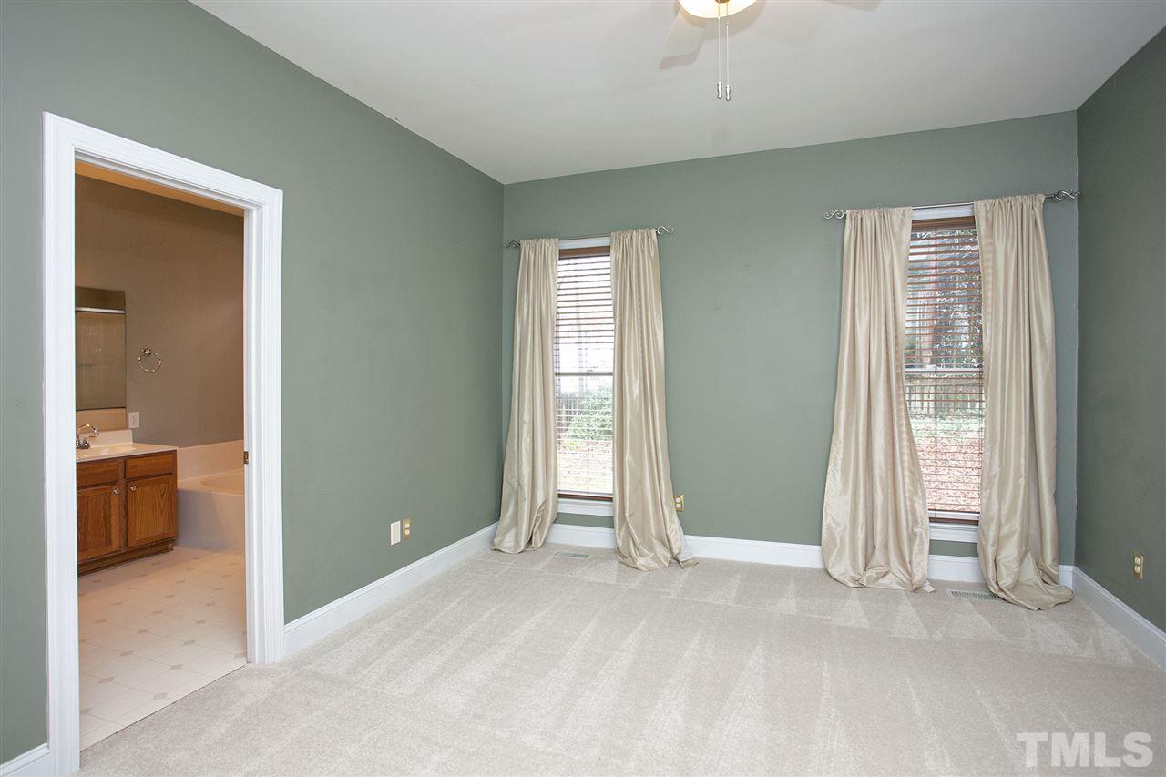 5216 Covington Bend Drive Raleigh, NC 27613 - Photo 10 of 15 The convenience of the first floor master bedroom will make your life easy. You will be absolutely amazed when you open the door to the heated and cooled, huge walk in closet.