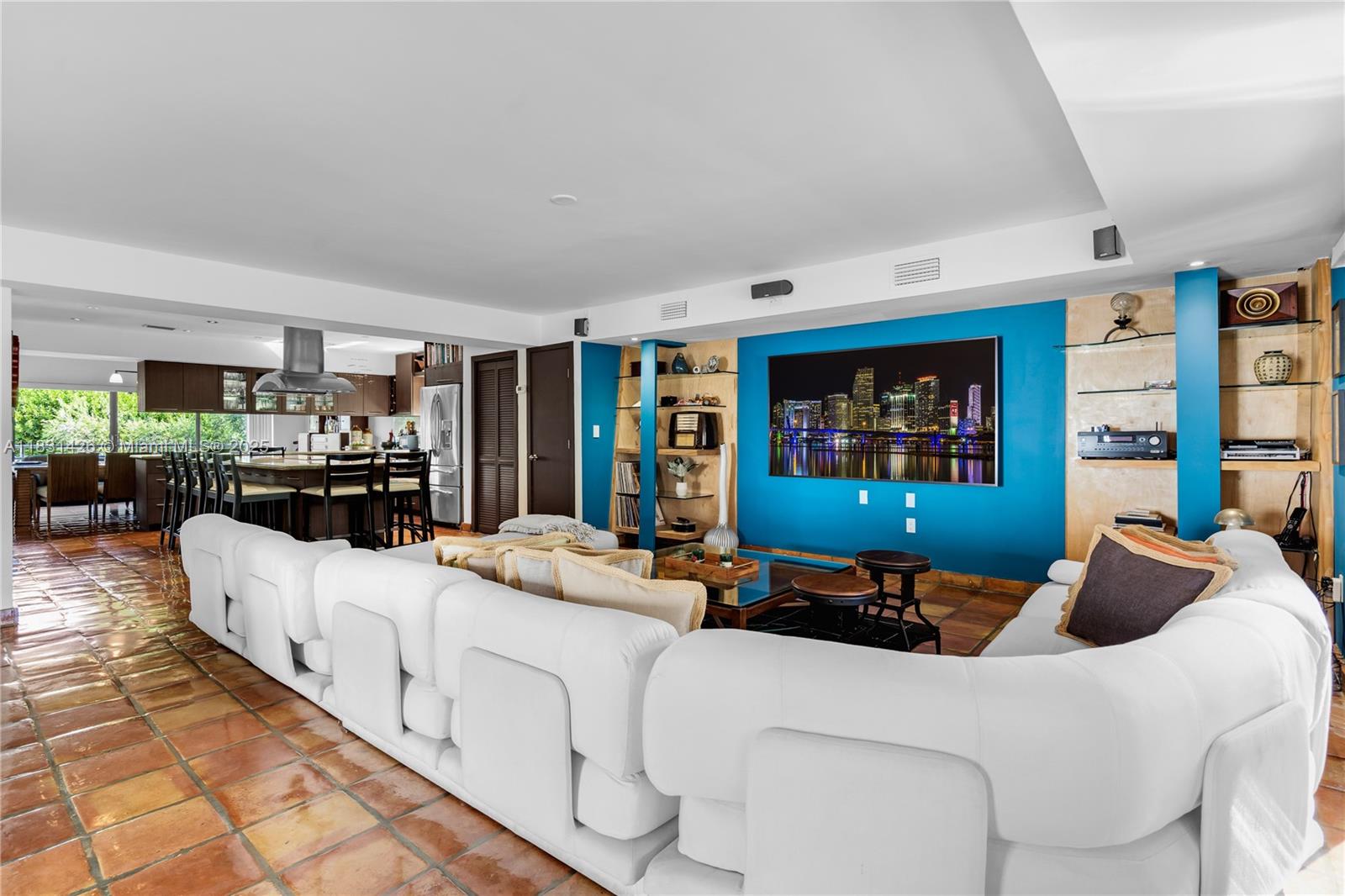 3520 Rockerman Road Miami, FL 33133 - Photo 12 of 41 a living room with furniture and a flat screen tv