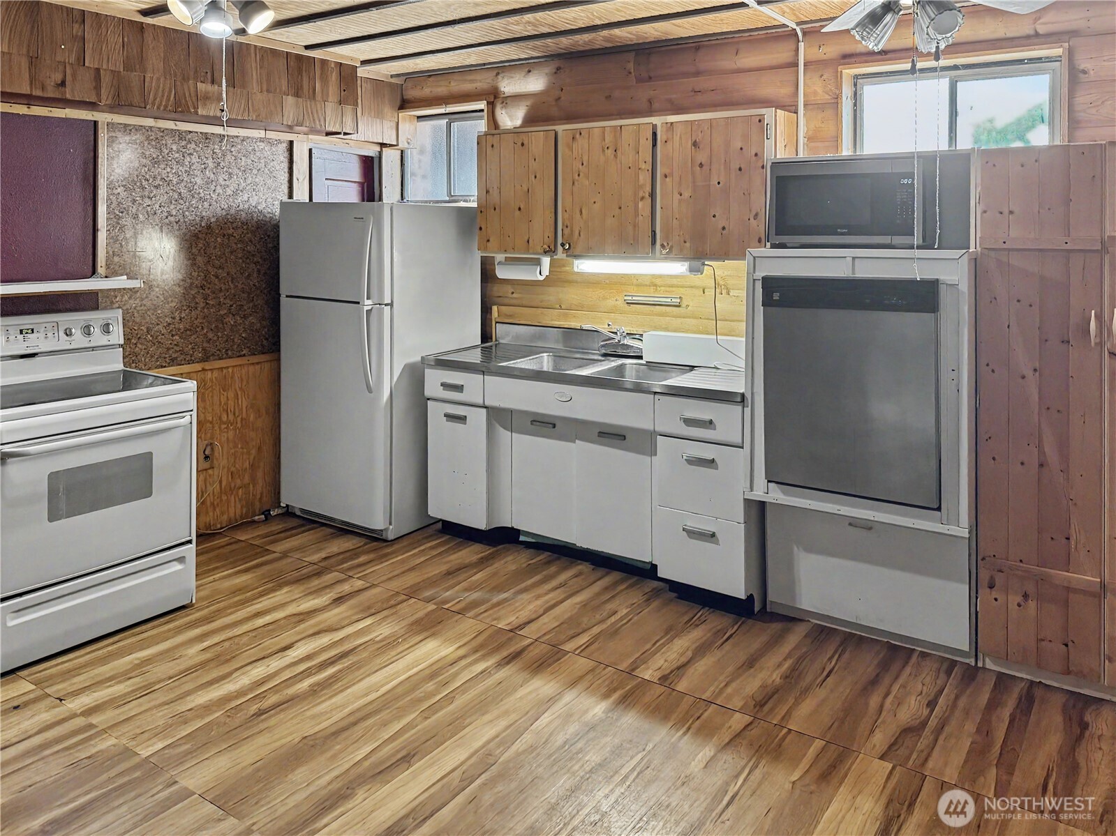 802 South Chelan Avenue Wenatchee, WA 98801 - Photo 13 of 40 a kitchen with stainless steel appliances a refrigerator and a stove