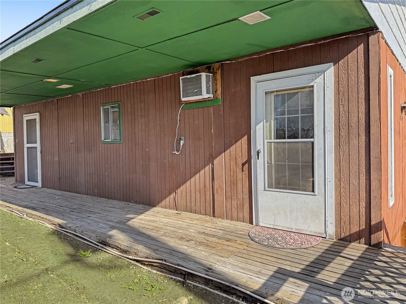 802 South Chelan Avenue Wenatchee, WA 98801 - Photo 21 of 40 a wooden door in front of a house