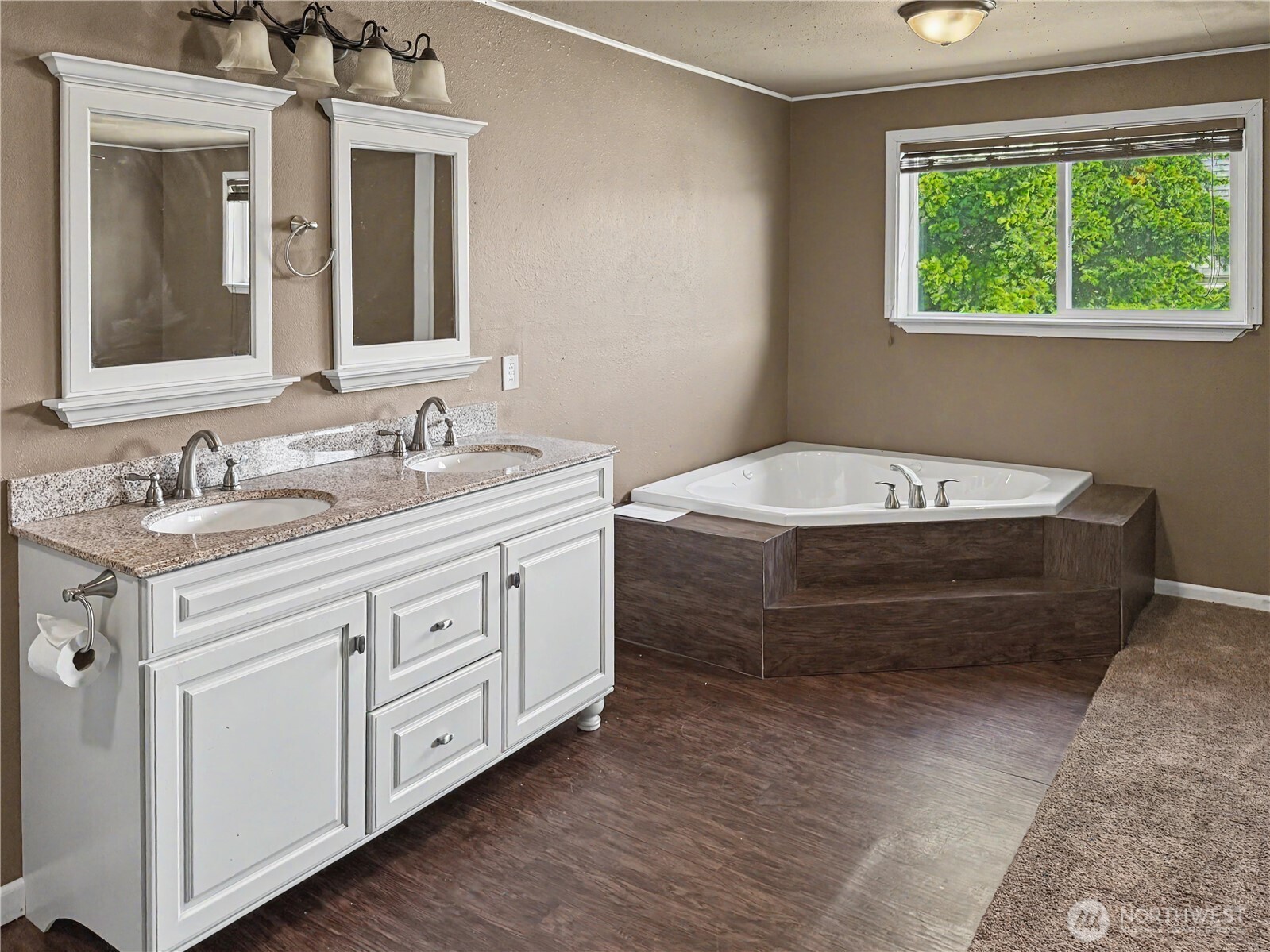 802 South Chelan Avenue Wenatchee, WA 98801 - Photo 29 of 40 a bathroom with a sink and a mirror