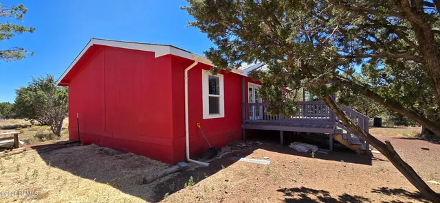 a kitchen with stainless steel appliances a stove a sink and a cabinets