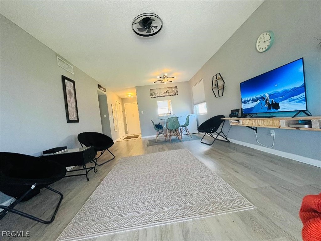 2210 Croton Court Lehigh Acres, FL 33936 - Photo 12 of 13 a living room with furniture
