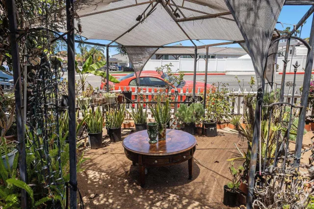a kitchen with stainless steel appliances a refrigerator and a stove top oven