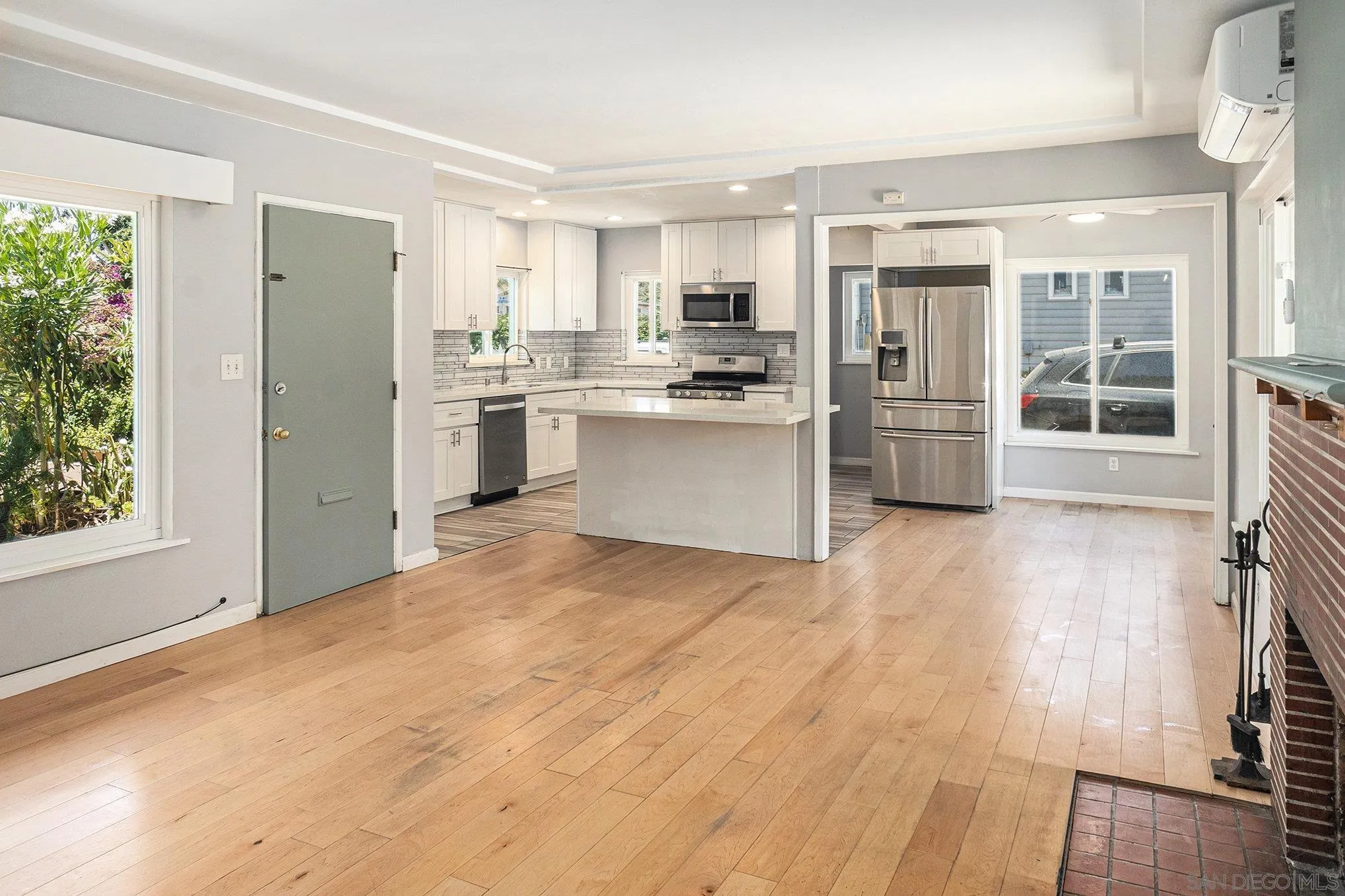 74 E Street Chula Vista, CA 91910 - Photo 34 of 56 a kitchen with stainless steel appliances a refrigerator and a stove top oven