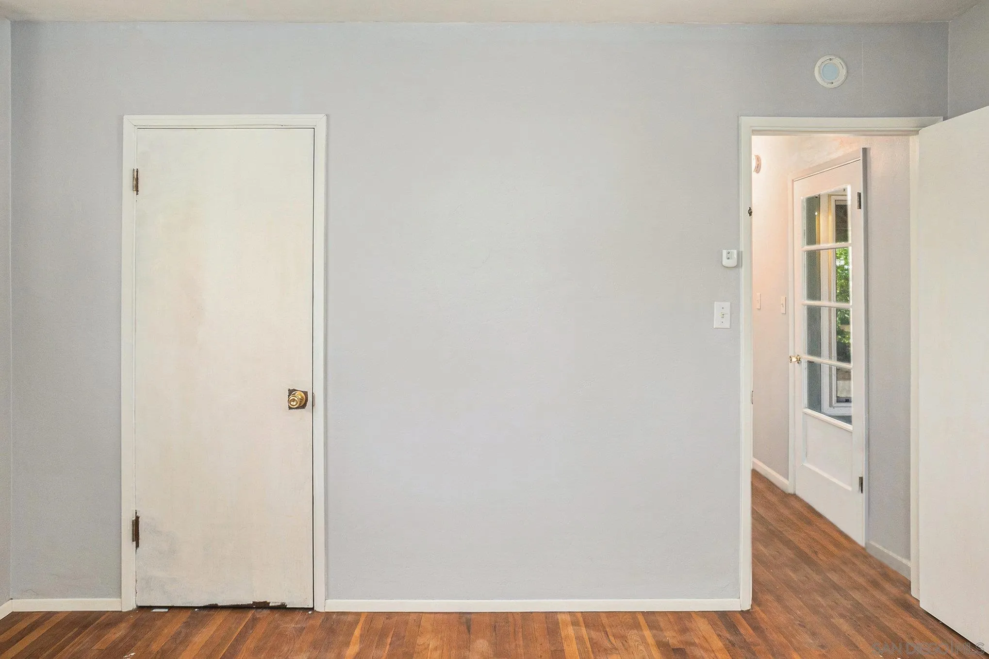 74 E Street Chula Vista, CA 91910 - Photo 56 of 56 a view of a hallway with wooden floor