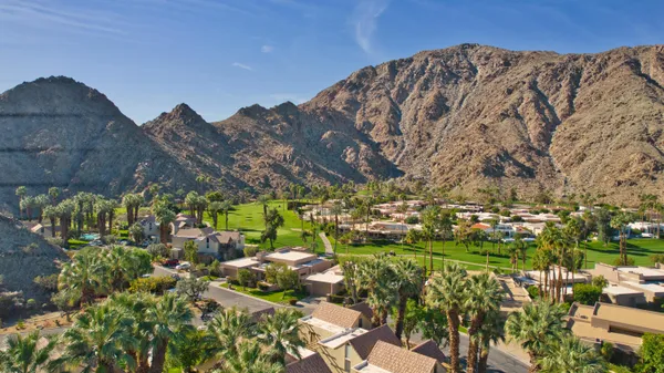 a front view of a building with street view