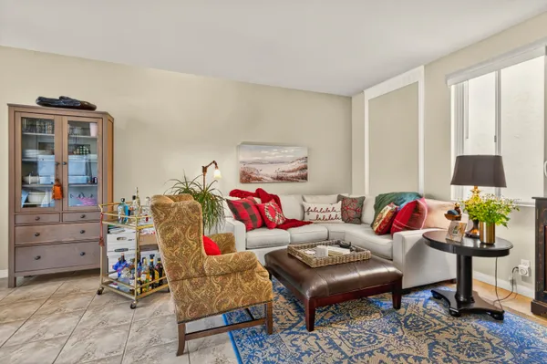 a dining room with furniture mountain view and a window