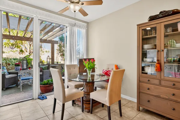 a view of living room with furniture and a window