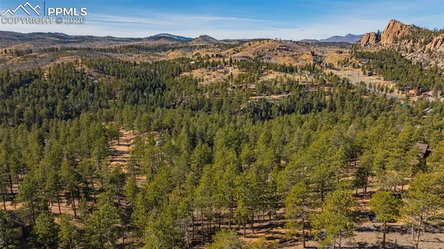 a view of a city with mountain