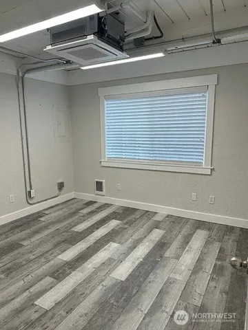 a view of a room with rack on the wall