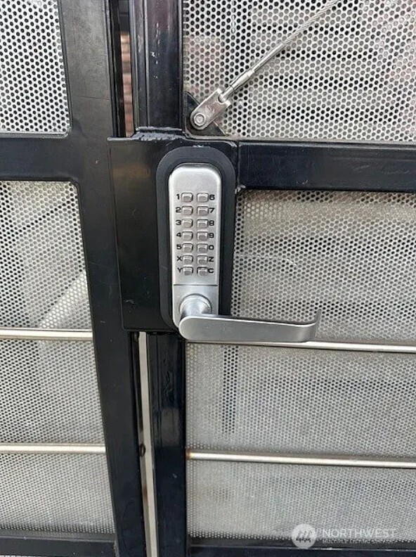 118 4th Avenue Southeast, Unit 118 Puyallup, WA 98372 - Photo 4 of 14 a view of a brick wall with wooden floor