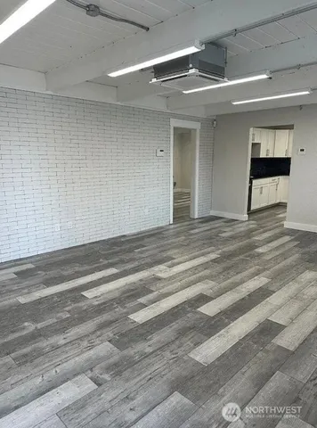 a view of an empty room with a window